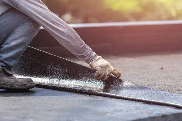 Professional Exterior Waterproofing technician working in Athens, IL